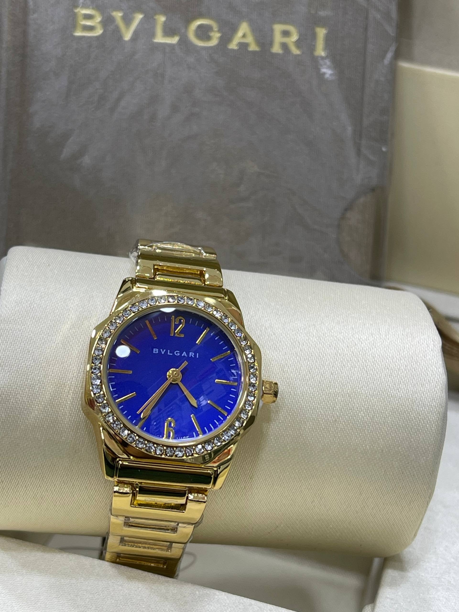 BVLGARI Gold – Diamond Bezel